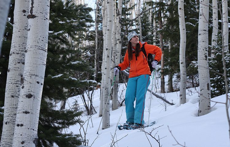 White Pine Touring snowshoe guide, Victoria Ritzinger, breaks trail in between switchbacks on Rob's Trail in Park City, Utah. Photo by Kim Fuller