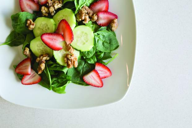 The strawberry walnut salad with spinach and cucumber and a cashew balsamic vinaigrette